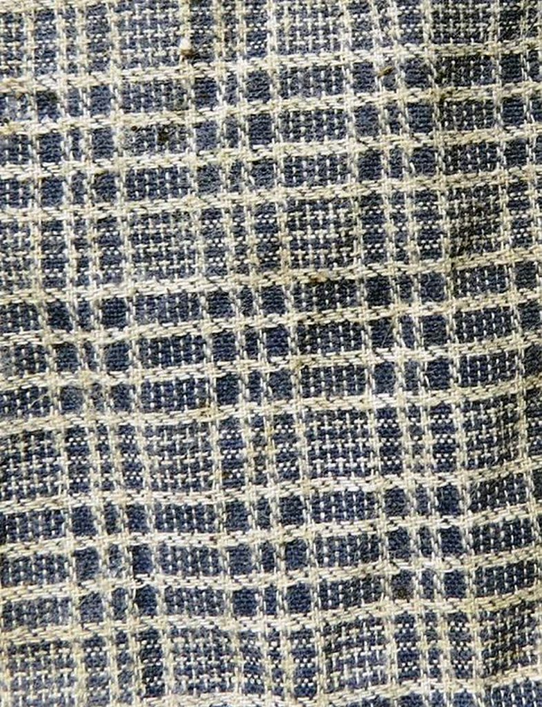 A close up of fabric from the cotton fibre bag the man was found in. A close up of fabric from the cotton fibre bag the man was found in.